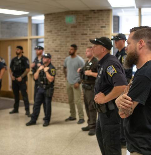Handlers and officers at a K9 seminar briefing